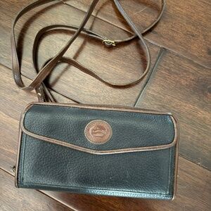 Dooney & Bourke black and brown Leather wallet on a crossbody strap